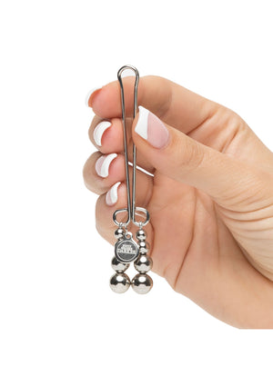 Pince clitoridienne à perles