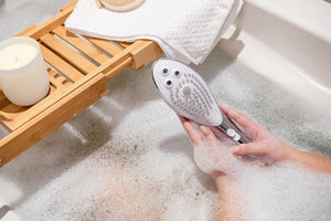 Womanizer Wave – Douchette intime 2‑en‑1