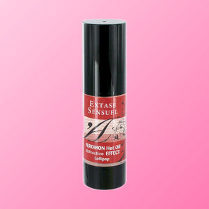 Extase Sensual – Huile de massage chauffante aux phéromones, sucette (30 ml)