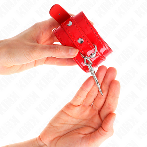 Kink – Manchettes brillantes rouge ajustables 23-33 cm